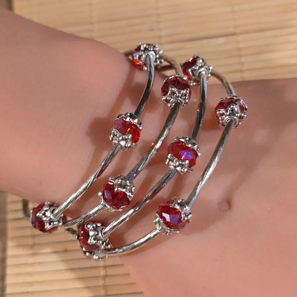 Silver Tone Crystal Wrap Bracelet With Red Faceted Beads & Filigree Details